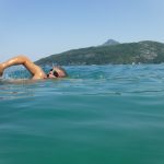Raj Baksi swimming in Lake Annecy